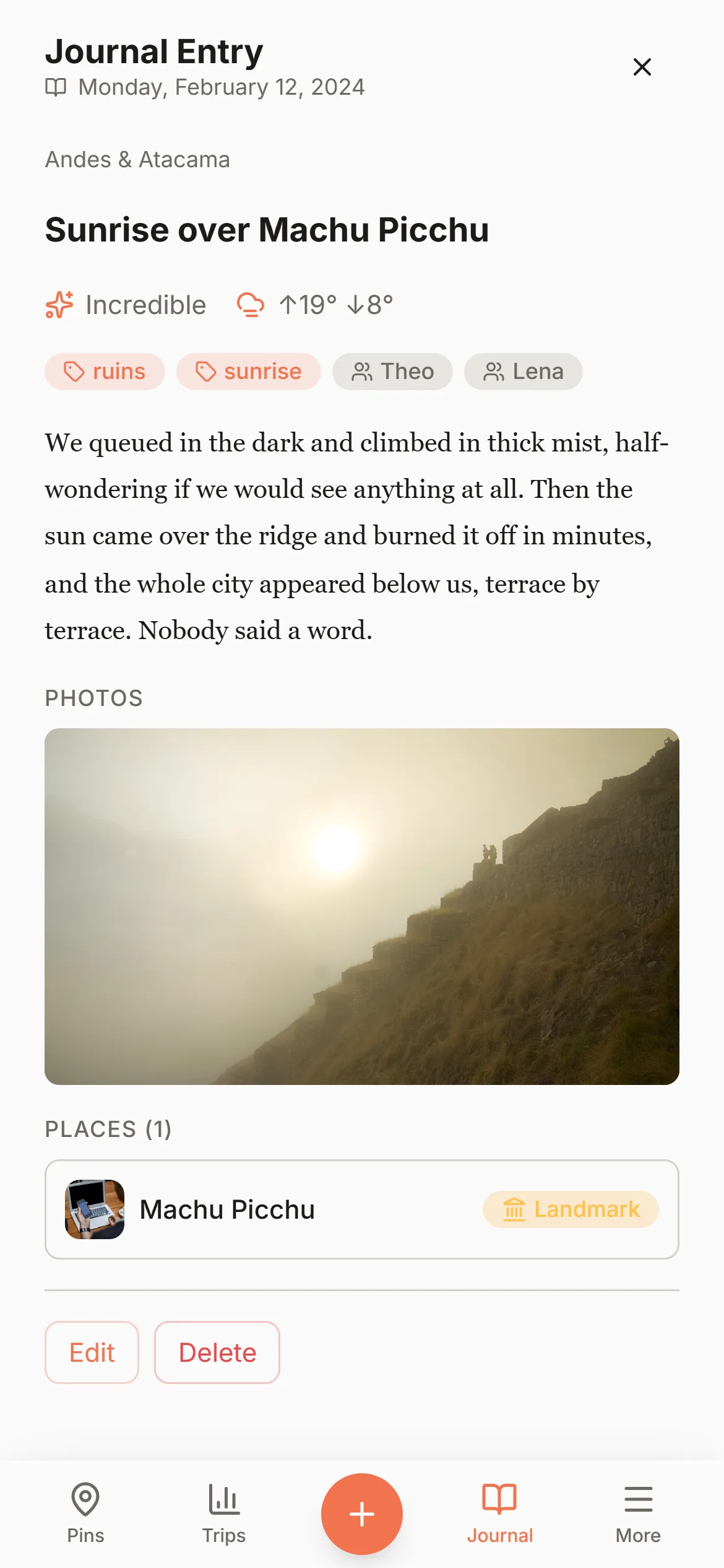 Wandria's 'Sunrise over Machu Picchu' journal entry, mist lifting off the ruins, with photos attached to the pin.